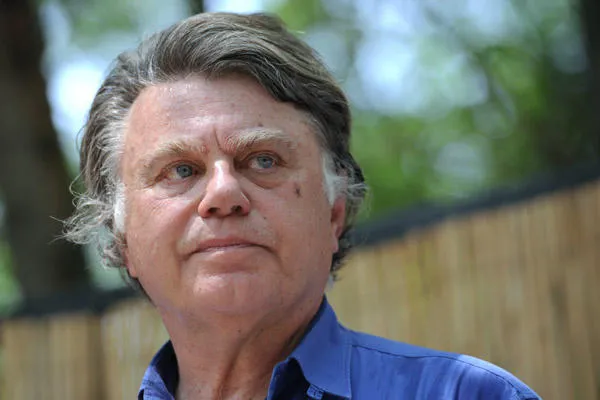 le député du parti d'extrême-droite français (fn) gilbert collard (c) s'adresse aux sympathisants le 14 juillet 2013 lors d'un banquet de la fête à saint-gilles, sud de la france afp photo anne-christine poujoulat