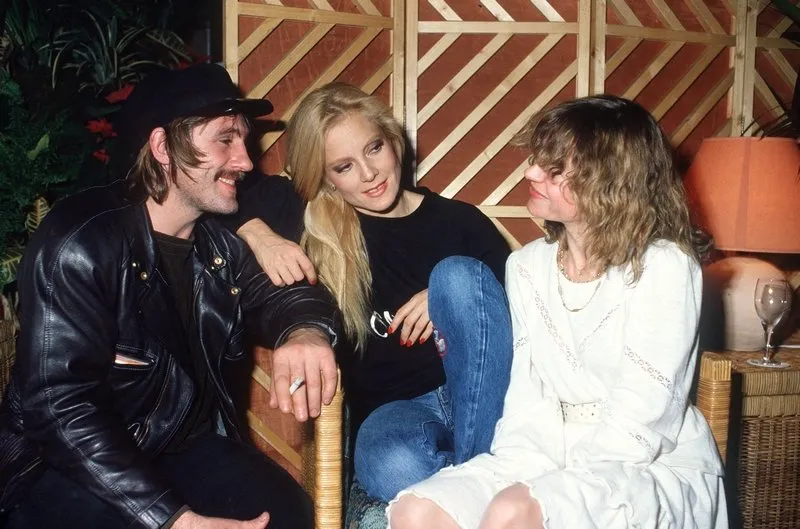 french actor gerard depardieu and his wife elisabeth congratulate french singer sylvie vartan (c) as she performs at the palais des congres of marseille, on november 1981 (photo by joel robine   afp)