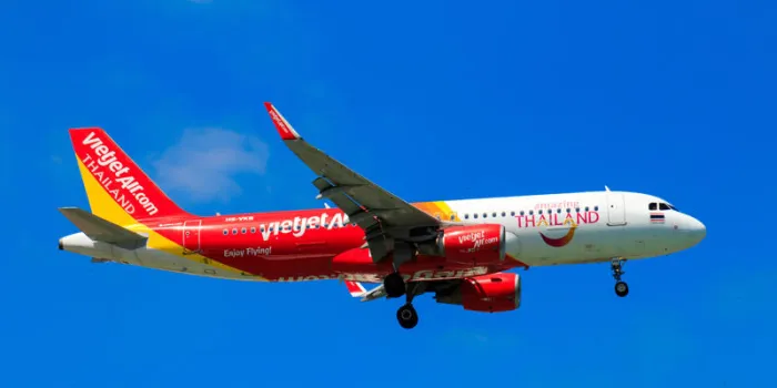 chiangmai thailand - september 2017 vietjet air airplane landing at chiangmai international airport in morning day on september 20,2017 in chiangmai thailand
