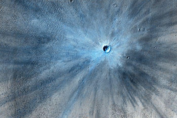 Un cratère sur Mars, résultant de l'impact d'une météorite