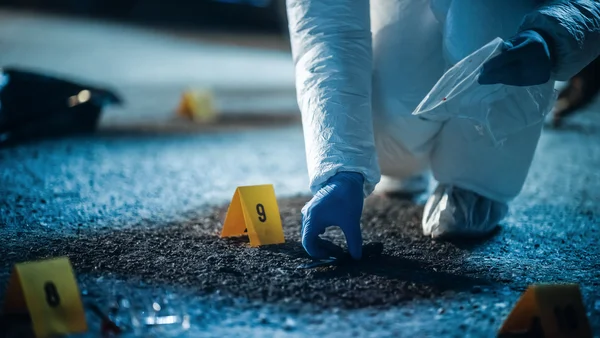 A crime scene with evidence markers