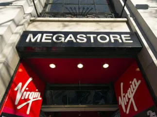 vue de l'entrée de la mégastore vierge prise avant une manifestation d'employés vierges contre les suppressions d'emplois sur l'avenue des champs-elysees, le 29 décembre 2012 à paris afp photo lionel bonaventure