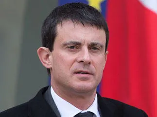 le ministre de l'intérieur français manuel valls quitte le palais présidentiel d'elysée après avoir assisté à la réunion hebdomadaire du cabinet à paris le 6 février 2013 afp photo bertrand langlois