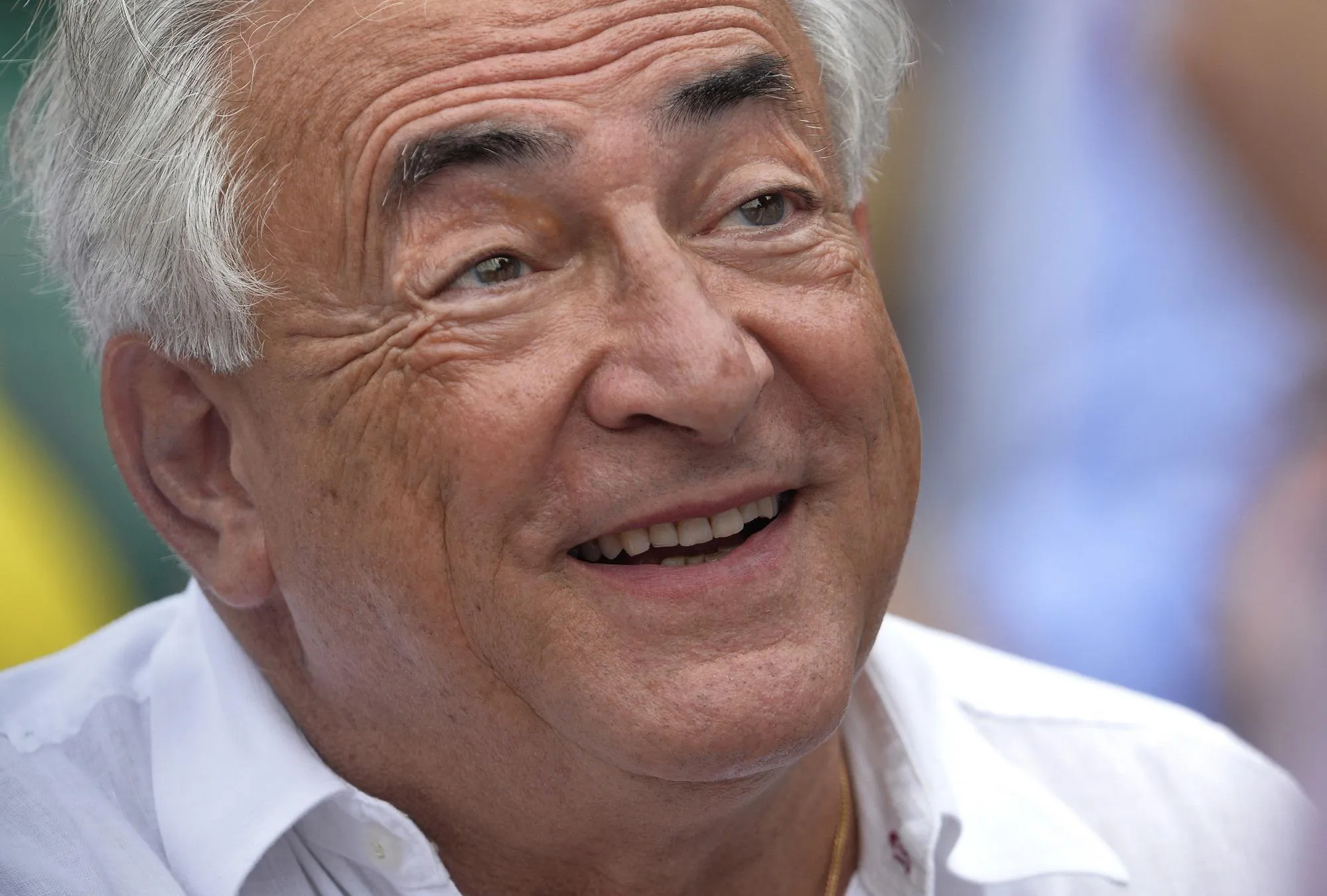 l'ex-chef de l'imf dominique strauss-kahn est photographié à l'issue de la finale du tennis féminin français au stade roland garros à paris le 8 juin 2013 afp photo miguel medina
