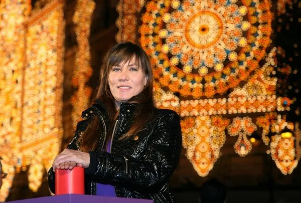 mathilde seigner turns on xmas lights at galeries lafayette store in paris