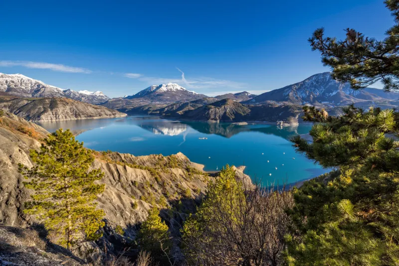 serre poncon lake from le rousset with winter view on saint vincent les fort and le sauze du lac a peaceful area in hautes alpes, the southern french alps france