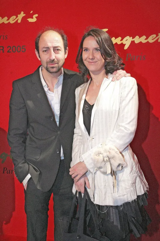 kad and his wife arrive at the fouquet's for the after party following the 30th cesar awards ceremony, in paris, france, on february 26, 2005 photo by klein-zabulon abaca