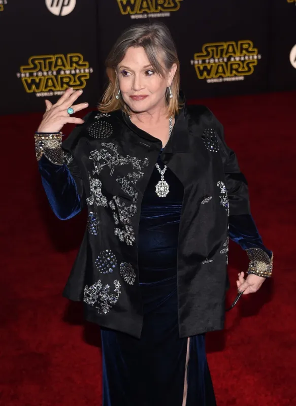 hollywood, ca - december 14  actress carrie fisher attends the premiere of walt disney pictures and lucasfilm's star wars  the force awakens at the dolby theatre on december 14, 2015 in hollywood, california  ethan miller getty images afp