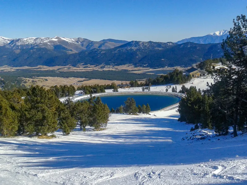 breathtaking view of the pyrenees ski resort with mountain lake, les angles, the pyrenees, france