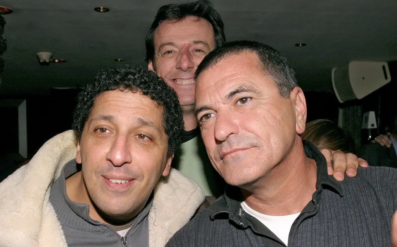 (l-r) french humorists smain and jean-marie bigard attend moet chandon pr franck couecou' party to celebrate the 10th anniversary of his job, at the vip room in paris, france, on november 25, 2004 photo by benoit pinguet abaca