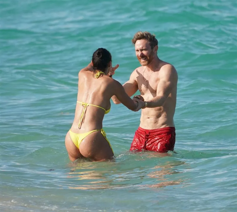 david guetta beachside with bikini-clad girlfriend - miami