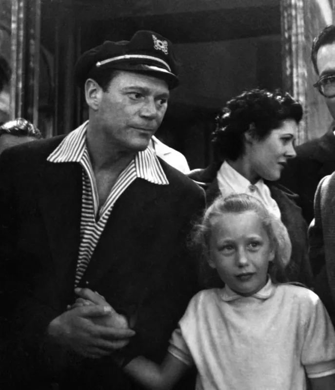 french actress brigitte fossey, 11, holds hand of us actor eddie constantine, born edward constantinowsky, on may 1,, 1955, during cannes film festival  afp photo intercontinentale (photo by afp)