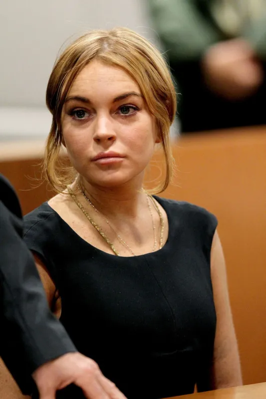 lindsay lohan and her new lawyer mark heller appear in court at the airport courthouse in los angeles amid charges she violated her probation