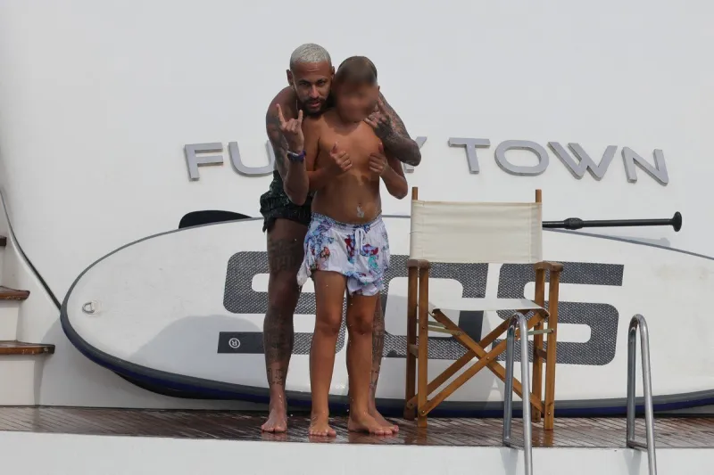 neymar soaks up the sun aboard yacht - ibiza