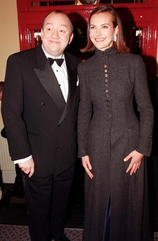 actor and director mel smith and french actress and chanel 5 model carole bouquet, hosts of the 1998 european film awards, arrive for the presentation ceremony 04 december at the old vic theatre in london (photo by neil munns   pa   afp)
