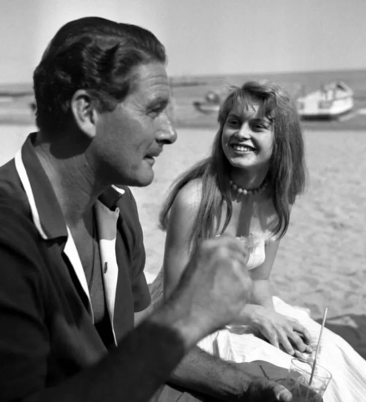 errol flynn and brigitte bardot, cannes, france, circa 1953 photo by everett abacapresscom