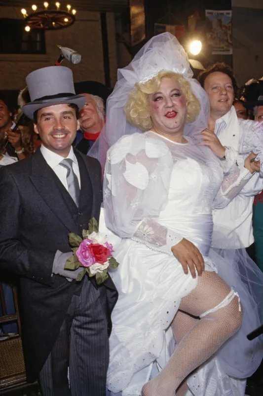 file photo taken on september 25, 1985 of the fake wedding of late humorists thierry le luron and coluche paul lederman stands behind photo by pascal baril abacapresscom , 486479 001 paris france