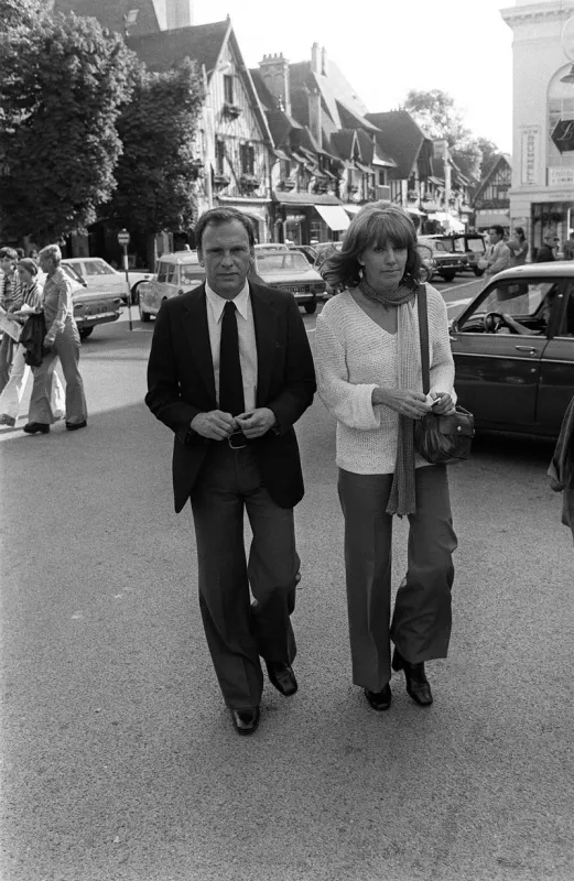 french actor jean-louis trintignant is accompanied by his wife film director nadine trintignant, on september 3, 1975 during the deauville american film festival (photo by afp)