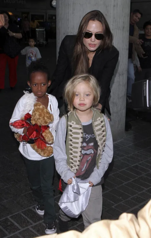 angelina jolie with zahara and shiloh at lax - los angeles