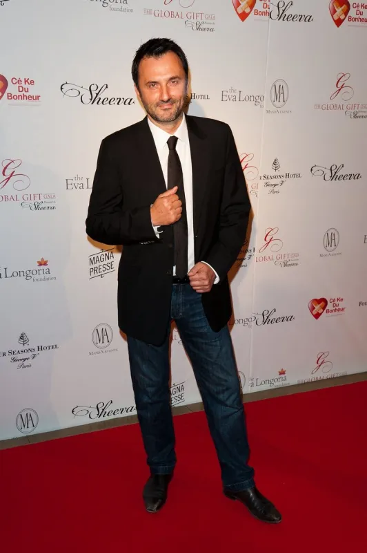 frederic lopez poses at a photocall for the global gift gala by sheeva held at the four seasons george v hotel on may 22, 2012 in paris, france photo by nicolas genin abacapresscom , 401529 081 paris f