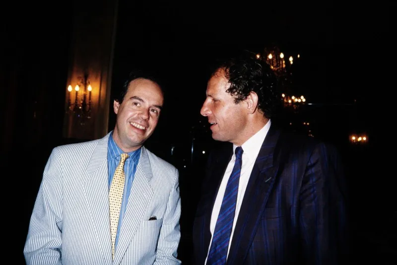 french tv host frederic mitterrand (l) speaks with french journalist patrick poivre d'arvor during the tf1 press conference in paris on june 23, 1987 (photo by georges bendrihem   afp)
