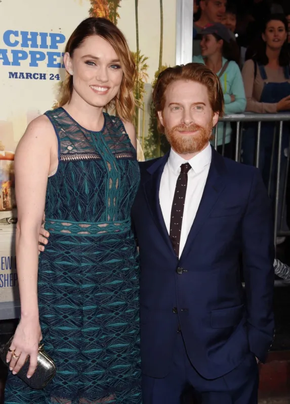 actress clare grant (l) and actor seth green arrive at the premiere of warner bros pictures' 'chips' at tcl chinese theatre