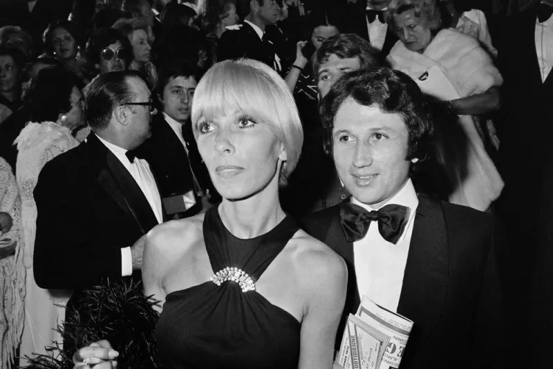 french tv host michel drucker and his wife dany saval pose during the cannes film festival in cannes, southern france, on may 14, 1975 (photo by ralph gatti   afp)