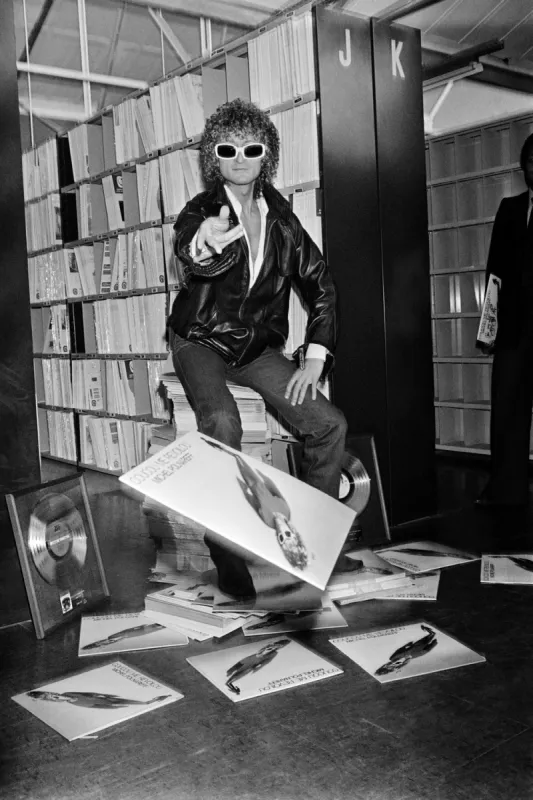photo taken on october 30, 1978 in paris shows french singer michel polnareff as he just received a gold record for his record coucou me revoilou after his exil in usa (photo by gabriel duval   afp)