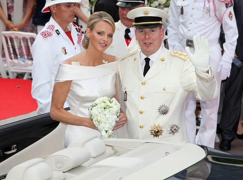 prince albert ii and princess charlene leave after the religious wedding in the prince's palace in monaco, 02 july 2011 the ceremony took place in the main courtyard of the prince's palace photo by albert nieboer dpa abacapresscom