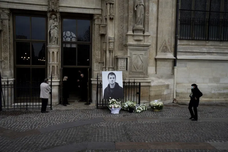 a portrait of late french actor gaspard ulliel is displayed outside the saint-eustache church in paris, france on january 27, 2022 ahead of his funeral service after he died at 37 following a skiing accident on january 19 photo by abacapresscom