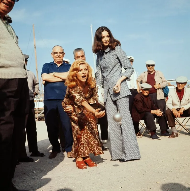 french singer nicoletta and actress evan swann play pétanque, on may 1971, in cannes (photo by afp)