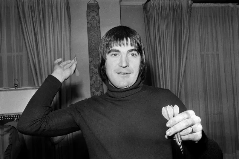photo taken in 1973 shows french singer serge lama playing darts (photo by afp)