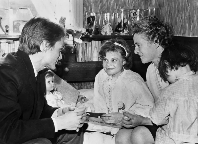 picture released on february 1964 of french singer claude francois who came to lisette malfoy' house to sing for this 16 years-old girl, suffering of leukaemia, in outreau (photo by afp)