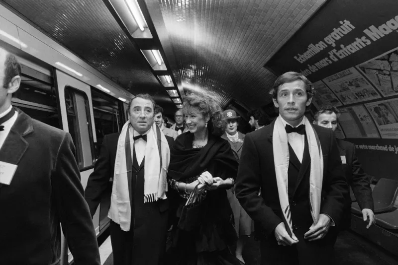 french actors claude brasseur (l), nathalie baye (c) and belgian former racing driver jacky ickx (r) get out the subway to attend the 8th césar awards, on february 26 février 1983, in paris (photo by joel robine   afp)