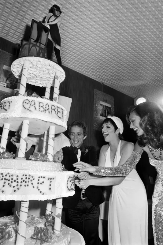 us singer liza minnelli (c), us actor joel grey (l) and actress marisa berenson (r) celebrate on september 13, 1972 at the end of the premiere of the movie cabaret in paris (photo by afp)
