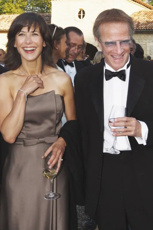 sophie marceau and christophe lambert attend the 'fete de la fleur' party - france