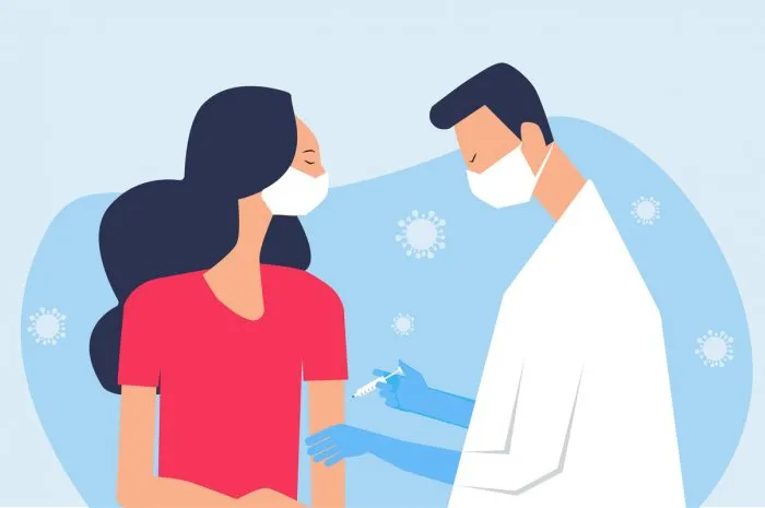 doctor inject vaccine shot to patientcovid-19 vaccination concept