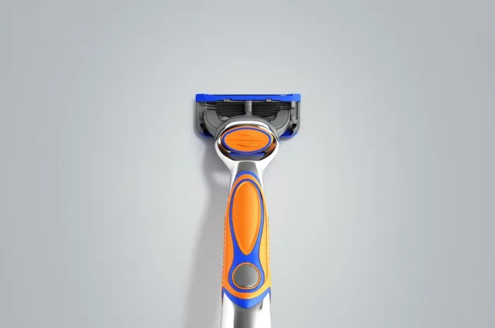 mens razor 3d render on grey background