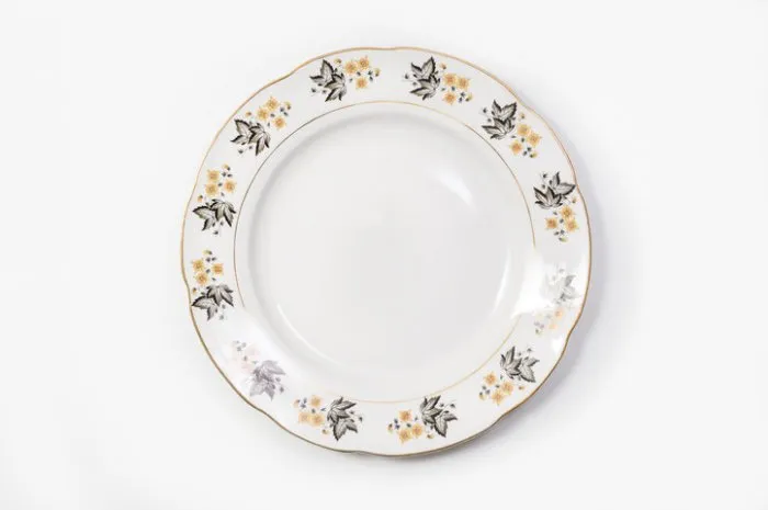 luxury vintage porcelain tableware - large plate on white background, top view