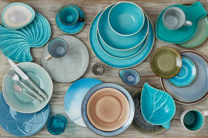 different plates on wood