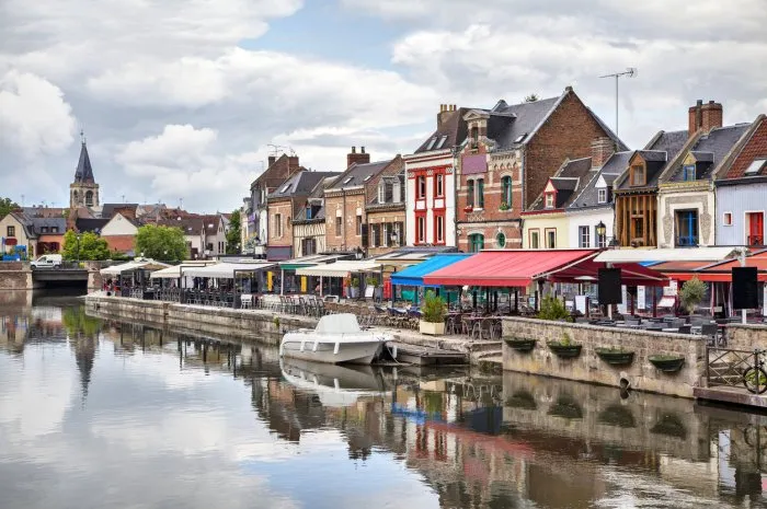 colorful summer verandas of restaurants on the belu embankment in amiens, france