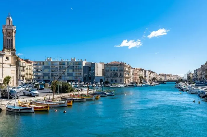 sète in france, traditional boats moored at the quay in the city centre