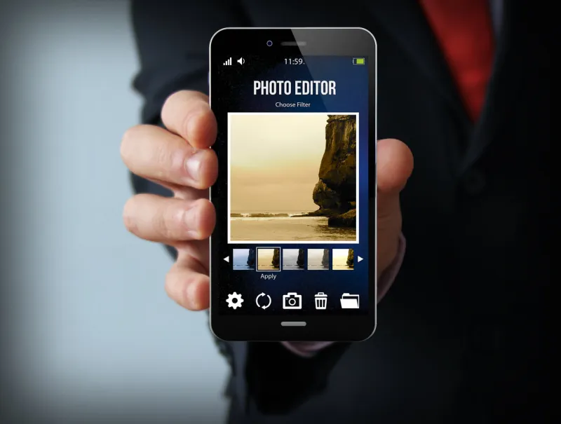 modern photography concept  businessman holding a photo editor smartphone