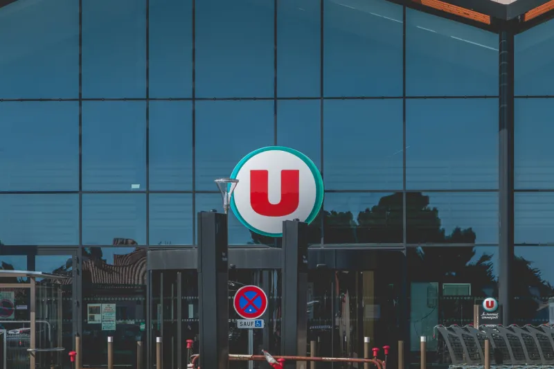bretignolles sur mer, france - july 31, 2016  view of the entrance of a super u store, a supermarket dependent on a cooperative of french retailers