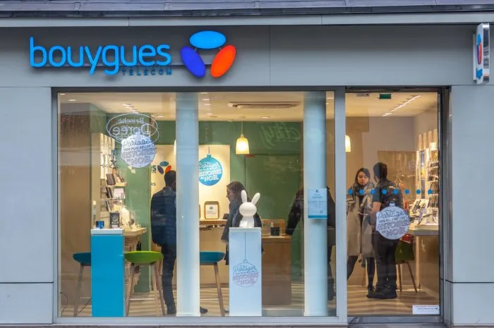 logo of bouygues telecom on their main shop on rue de rivoli avenue in paris, france, during a cloudy afternoon part of the bouygues group, bouygues is one of the biggest french internet serviceprovider and mobile phone operator