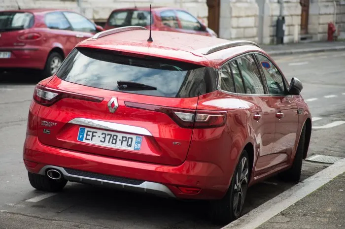 mulhouse - france - 26 january 2020 - rear view of red renault megane gt parked in the street