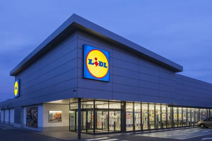 cartagena, spain - may 17, 2017  new lidl supermarket building illuminated at dusk lidl is german discount supermarkets chain based in neckarsulm, germany