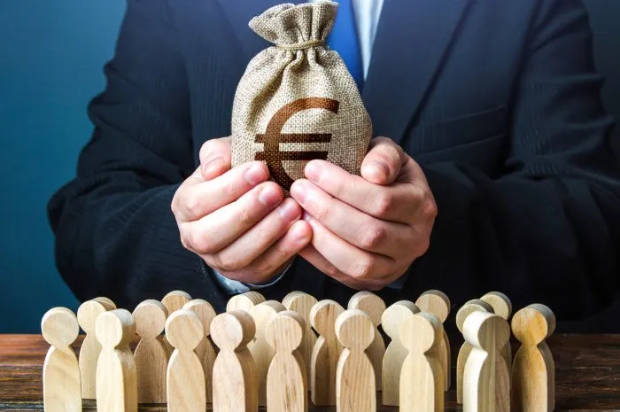 businessman holds out a euro money bag to the crowd official staff maintenance financial support tax collection compensation payments share profit providing money, paying salaries and grants