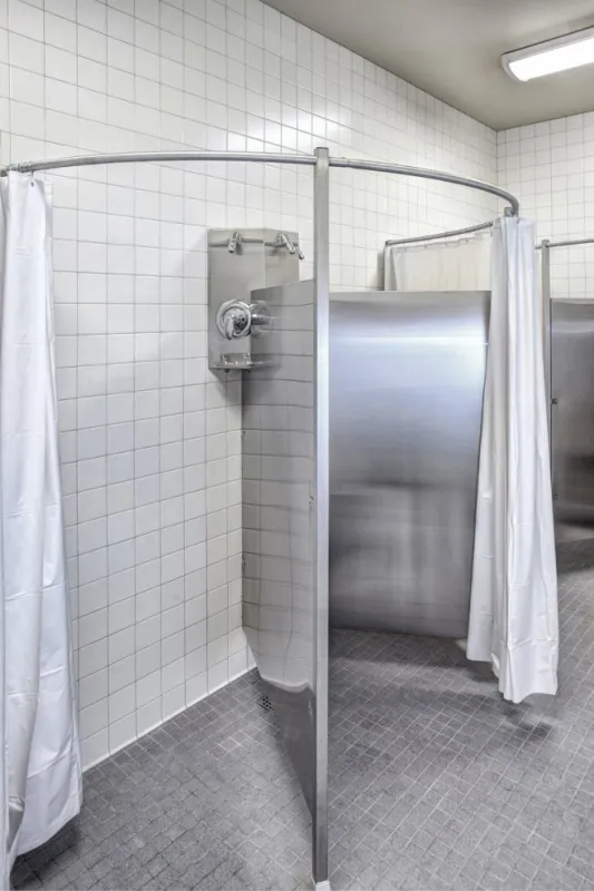 the interior of a new high school locker room