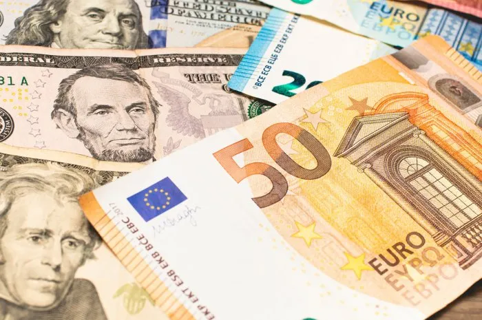 united states dollar banknotes and european union euro banknotes finance, economy, international business, foreign exchange and travel budget concepts